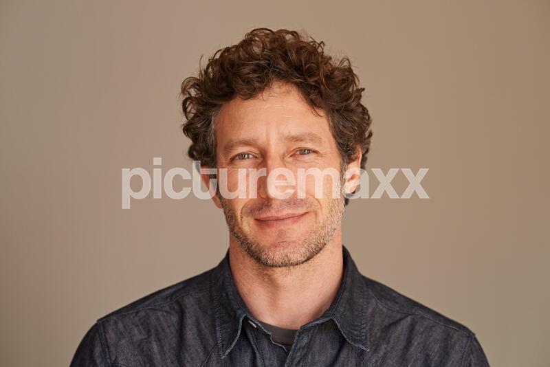 Portrait of a handsome young man in the studio.